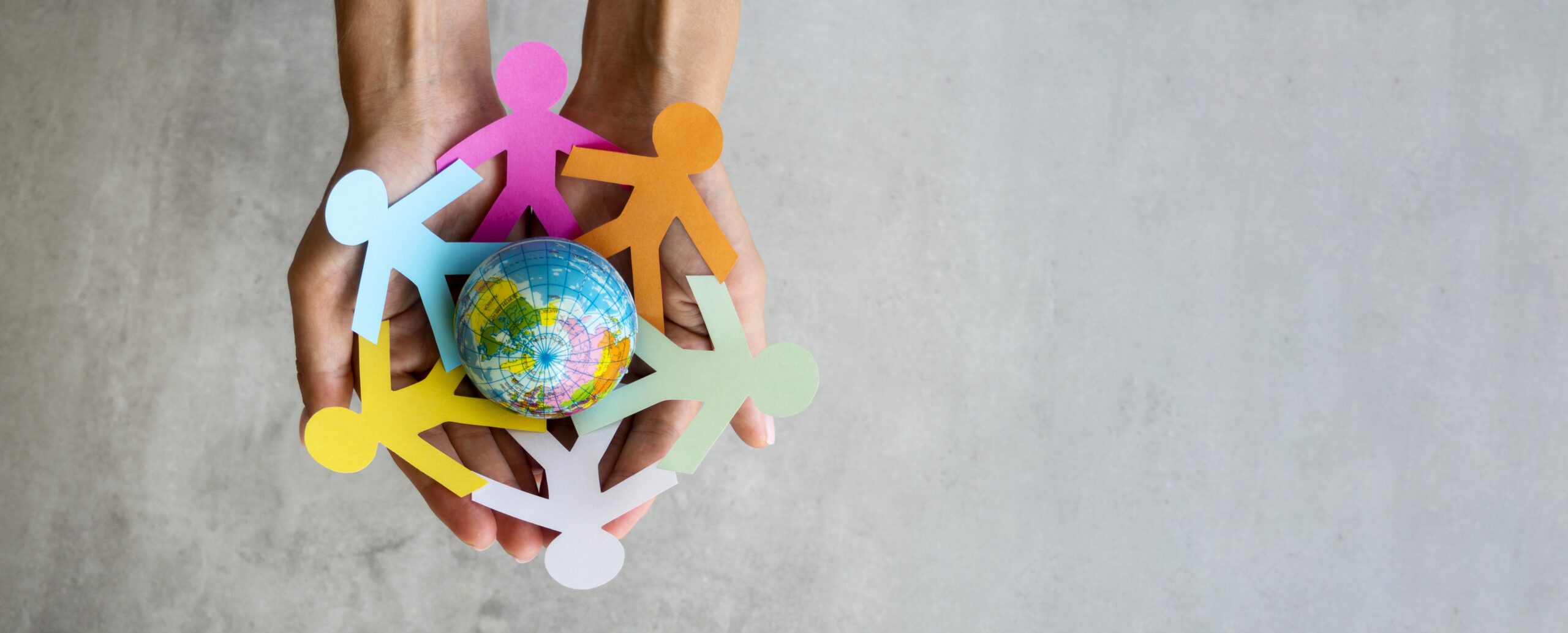 origami chain people with globe